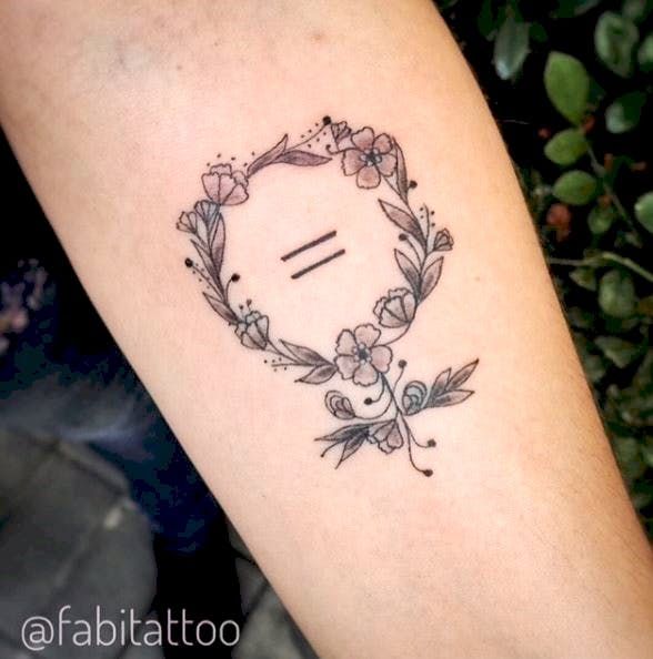 Venus symbol and flowers tattoo on arm - Tattoo Designs for Women